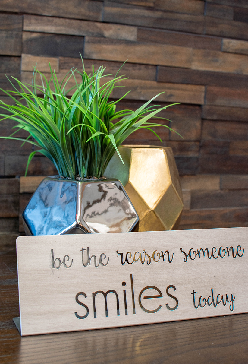 Smile sign O'fallon dental works lobby sign